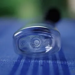 Butelka  50 ml PET z czarną nakrętką flip-top, owalna