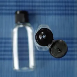 Butelka  50 ml PET z czarną nakrętką flip-top, owalna