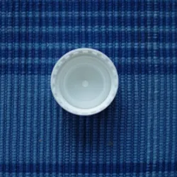 Butelka 250 ml PET z białą nakrętką z reduktorem, owalna